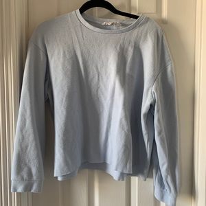 Cropped, ribbed light blue sweater